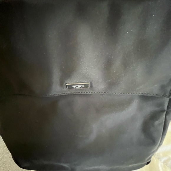 TUMI Kaylin Crossbody Nylon with leather fabric strap and leather strap. - Picture 8 of 9